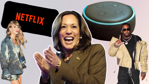 A Black South Asian woman wearing a brown suit smiles wide. From left to white, a white woman, a red NETFLIX logo on a phone, a gray circular device and a Black man making a L with his left hand is pictured.